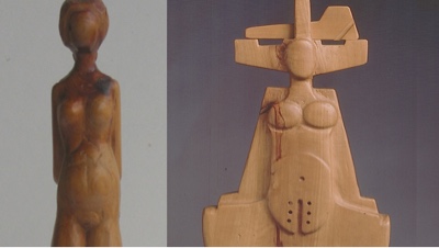 Dos esculturas en madera de Romero D. Fran: una figura femenina estilizada y una figura totémica de formas geométricas